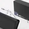 Nuevo estilo metal pata cruzada crostar moda sin marco liso gafas hombres y Mujeres Negocio artístico miopía armazón de gafas ópticas