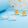 Pendientes de botón de flor tridimensional mate irregular retro francés súper hada para mujer, exquisitos, versátiles, de moda, verano, sensación de alta gama
