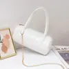 Bolso de lunares 2026 bolso de mujer de nicho nuevo estilo moderno mini bolso cruzado simple bolso de mano casual bolso cilíndrico redondo