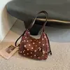 Bolso femenino de alta costura vintage relajado, nuevo bolso de hombro para el otoño de 2026 para ir al trabajo, bolso tote de moda para el trabajo