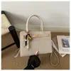 Comércio exterior casual retrô workwear 2026 luxo leve pingente PU bolsa simples chique ombro transversal para mulheres