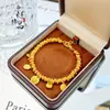Tienda de Oro Mismo Estilo Dorado Antiguo Chapado en Oro Dios Amarillo de la Riqueza Pulsera Pequeña de Fortuna, Nuevo Estilo Chino Pulsera del Dios Amarillo de la Riqueza para Mujeres