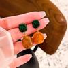 Pendientes de resina con flor de aguja anti-plata 925 estilo retro de Hong Kong para mujer, elegantes y nuevos pendientes sencillos de diseño de nicho para mujer.
