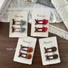 Corea del Sur Nuevo Otoño e Invierno Botón Amor Cuero Niños Niña Todo-partido Lazo Flequillo Pinza Lateral Accesorios para el Cabello de Niñas