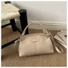 Comercio exterior al por mayor retro simple 2026 casual nuevo de moda para mujer bolso de mano elegante para el trabajo bolso de hombro cruzado