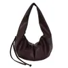 Bolsa de Ombro Grande Capacidade em Couro Macio Retrô Feminina Novo Estilo Primavera 2026 Casual Minimalista Relaxado Bolsa de Axila Bolinho