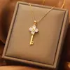 Collar Retro de Llave de Acero de Titanio para Mujer Estilo Ins Cadena de Clavícula Elegante con Borla de Cobre Microincrustado Chapado en Oro Real Cadena de Lana
