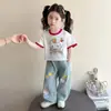Conjunto de Roupa Novo de Verão 2026 para Meninas Desenho Animado Casual Duas Peças para Menina Pequena Roupas da Moda Tendência para Bebê Menina