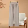 Pantalones de lana casuales y a la moda para mujeres de mediana edad y mayores, nuevo estilo otoño 2026, cintura elástica, adelgazantes y favorecedores, pantalones de pierna recta para madres