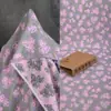 Tela jacquard de relieve tridimensional de rosa de cabeza simple y doble repujada para ropa, vestidos, trajes, tela decorativa de diseñador