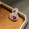 Broche de Calabaza Hueca con Piedra Roja de Corindón Imitación Lujo Ligero Chapado en Oro Potente Versátil Estilo Nacional Hebilla Magnética Hebilla Magnética para Hombres y Mujeres