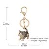 Llavero de gato lindo transfronterizo metal hueco nicho moda charm personalizado cadena para colgar en el coche teléfono llavero