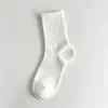 Calcetines de algodón de Xinjiang para hombre, 100% algodón puro, antibacterianos, absorbentes de sudor, transpirables, resistentes al olor, calcetines cortos en blanco y negro, de longitud media para hombre en otoño e invierno