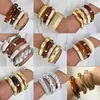 Accesorio transfronterizo de gran venta, producto nuevo: brazalete abierto de forma de ola irregular para mujer, conjunto de tres piezas personalizado y de moda de joyería para mujer