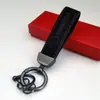 Colgante de Llavero de Cuero Gamuzado de Gama Alta para Coche Llavero con Logo de Coche Decoración de Llavero Colgante de Cintura de Metal Venta al por Mayor