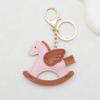 Novo chaveiro de venda quente Pegasus, bolsa criativa para casal, pingente de couro PU, cavalo de balanço, pingente pendurado para carro