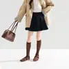 Falda Básica Plisada Estilo Academia para Niñas 2026 Otoño Nuevas Llegadas Elegante Versátil de Línea A de Gama Alta para Niños Moderna