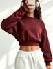 Top de manga larga con cuello redondo ajustado para mujer, estilo 'hot girl', transfronterizo 2026, versátil, para ir al trabajo, top corto al por mayor