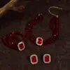 Collar y pulsera de perlas de imitación con flor de diamante francés, cadena de clavícula de nicho de moda, joyería de alta gama que combina con todo.