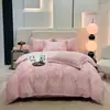 Juego de ropa de cama de cuatro piezas de algodón cepillado engrosado, perfecto para el calor del invierno, con un estilo de lujo ligero de algodón puro