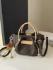 Bolsos populares para mujer transfronterizos este año: Nuevo bolso de cubo de mano súper popular para el otoño de 2026, bolso versátil de hombro y cruzado