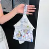Caixa de lenços floral Xiaohongshu, pendurável, caixa de lenços com laço de desenho animado estilo ins, armazenamento portátil, sala de estar estilo coreano