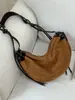 Nuevo modelo de otoño de 2026 estilo Hong Kong retro diseño de color liso bolso de hombro, bolso cruzado casual de nicho único y a la moda