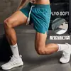Pantalones cortos holgados de cinco puntos de secado rápido para hombre, novedad de verano de 2025, pantalones deportivos informales de playa de seda fina para hombre