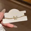 Pulsera ajustable de mariposa con circonita simple, pulsera de lujo ligero, de alta gama, exquisita, diseño de nicho para commuters, joyería al por mayor