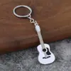 Novo chaveiro pingente de guitarra transfronteiriço, pingente criativo de instrumento musical, liga de zinco DIY decoração para mochila de estudante