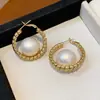 Modernos y Minimalistas Brazaletes para Oreja Retorcidos de Piedra Ojo de Tigre para Mujer, Pendientes Versátiles Vintage, Accesorios para Orejas de Otoño e Invierno con un Toque de Lujo Ligero y de Alta Gama