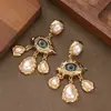 Pendientes de Borla de Perla Ojo del Diablo Estilo Vintage Personalidad Retro Francesa Sensación de Alta Gama Gran Lujo Marca Grande Pendiente Exquisito