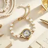 Pulsera de perlas superventas transfronteriza, reloj de cuarzo con números romanos para mujer, disponible en stock, tres colores para elegir