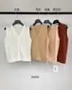 Suéter de Punto sin Mangas Holgado con Botones, Cuello en V, Bordes Deshilachados Texturizados, Minimalista Wabi-Sabi Han Xun para Mujer, Estilo Verano 2026 26868
