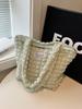 Bolso de mujer 2023 nuevo bolso de hombro de flor de burbuja moderno que combina con todo lindo bolso tote de otoño e invierno bolsos transfronterizos