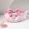 Bolsa de armazenamento de maquiagem Sanrio em estoque, bolsa de mão autêntica My Melody e Kuromi, bolsa fofa com zíper de laço