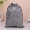 Bolsa con cordón de tela no tejida Máquina Cuerda Zapato Ropa Almacenamiento a prueba de polvo Embalaje Bolsa con cordón para juguetes en stock con logotipo impreso