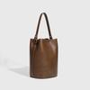 Bolsa Saco de Couro Macio Estilo Preguiçoso Design de Nicho para Mulheres Nova Moda 2026 Bolsa de Ombro Transversal para o Dia a Dia