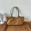 Bolso de lona suelto nuevo 2026, gran capacidad, diseño de retazos, colores contrastantes, asa larga, se puede llevar en la mano, al hombro o debajo del brazo, adecuado para el trabajo