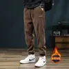 Nuevos estilos de otoño e invierno de pantalones para hombre para exportación: pantalones deportivos de pana con puños elásticos, forro polar, casual, deportivo, corte holgado