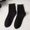 Calcetines de algodón para hombre, calcetines de caña media, otoño e invierno, negocios casual, algodón puro, primavera y otoño, calcetines para hombre, color liso, empaque individual, calcetines de algodón para cuatro estaciones