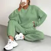 Conjunto de Duas Peças Europeu e Americano Transfronteiriço Primavera e Outono 2025 Novo Top Feminino de Tricô Torcido com Mangas Longas e Gola Redonda e Leggings