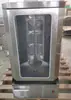 Estufa de barbacoa comercial de gas Shuangchi para Medio Oriente, de escritorio, vertical, rotatoria automática, calefacción eléctrica, raspador para pavo, cortador de carne