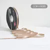 Lazo de regalo de color sólido de 1 cm flor decorativa para envolver material para ramos de cinta de satén venta al por mayor