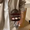 Bolso de mano de moda estilo coreano, de un solo hombro cruzado, diseño de nicho, otoño 2026, estilo de dibujos animados, versátil, mini bolso para mujer