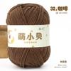 50.00g 1 volumen lindo bolsa tejida a mano de chenilla dorada de Beckham muñeco bolsa de material de ganchillo bola de lana al por mayor