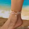 Europa y Estados Unidos transfronterizo nuevo playa cuentas de arroz concha joyería verano todo-partido estrella de mar concha cuentas de arroz collar tobillera traje