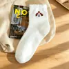 Calcetines de felpa hasta la pantorrilla con bordado de animal de felpa, suaves y amigables con la piel, adecuados para el uso diario, calcetines lindos y de moda para niñas