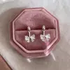Pendientes colgantes de lazo de circonita dulce Diseño nicho Super flash Pendientes únicos Pendientes de aguja de plata de alta gama para mujer