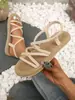 Sapatos baixos outono e verão nova moda sandálias femininas para exterior estilo de férias chinelos de tiras cruzadas praia Xia Wei